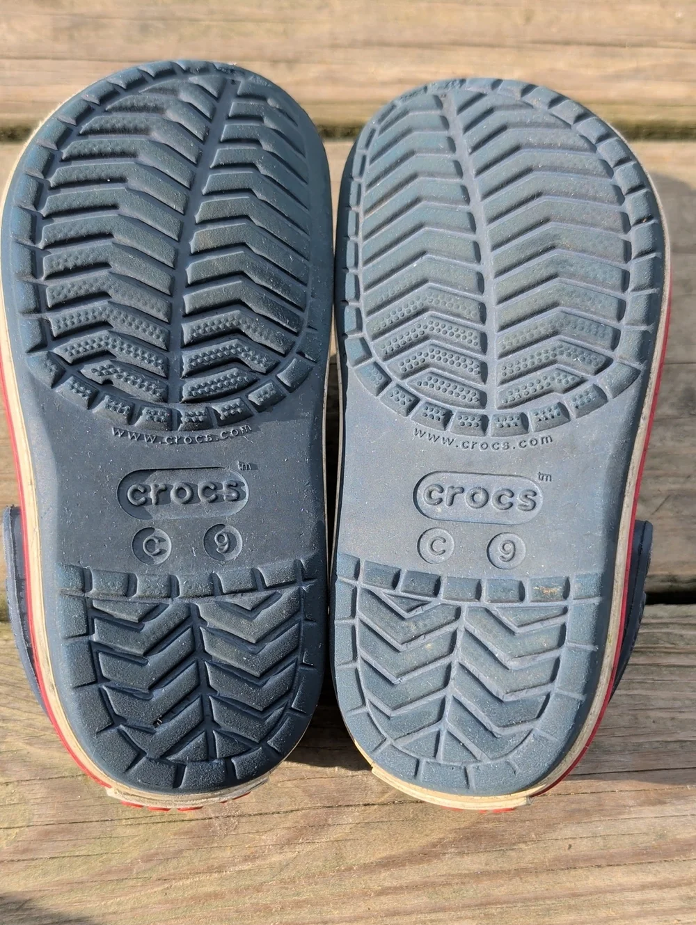 CROCS Kids Navy Clogs with Red Accents